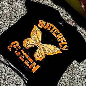 A cute butterfly shirt never worn